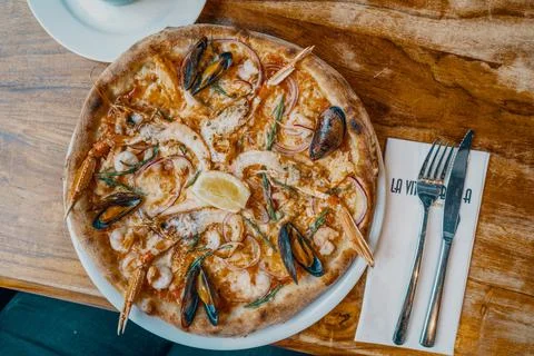 Pizza at a restaurant Stock Photos