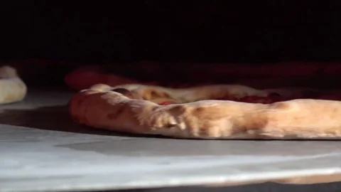 Pizza rotates in the oven Stock Footage 81116644