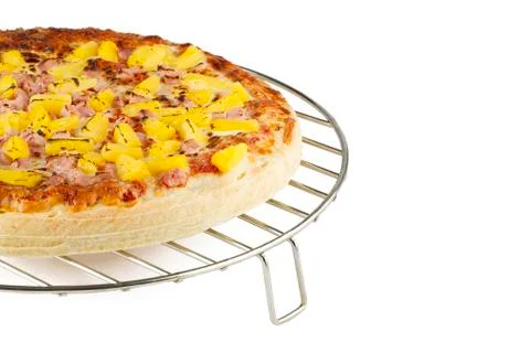 Pizza on round rack Stock Photos