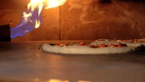 Pizza that runs in the oven Stock Footage 85007441