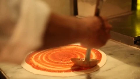 Pizza sauce chef Stock Footage 77670942