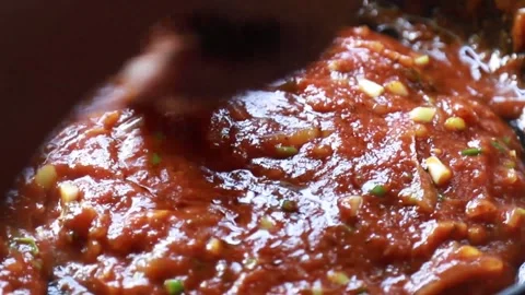 Pizza sauce made from scratch Stock Footage 150595339