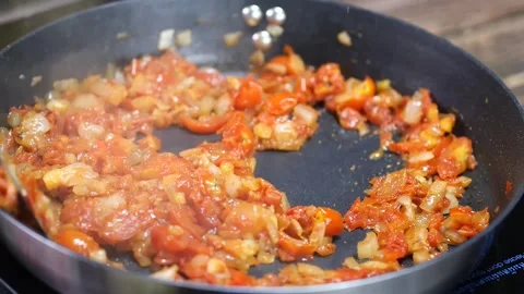 Pizza sauce prepairing. Close-up  Man Hands cooking Pizza sauce Stock Footage 150691738