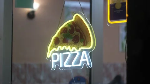PIZZA slice neon sign Stock Footage 335341915