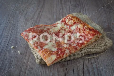 Pizza slice Stock Photos