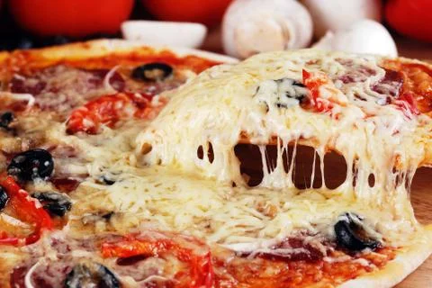 Pizza slice Stock Photos