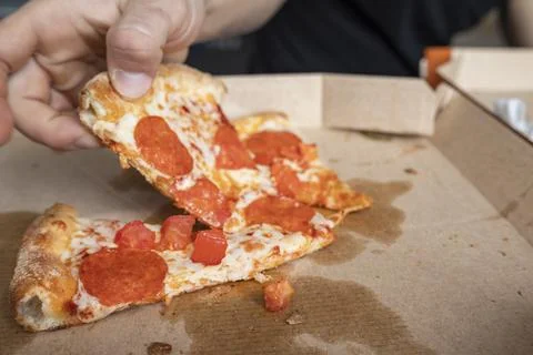 Pizza slice Stock Photos