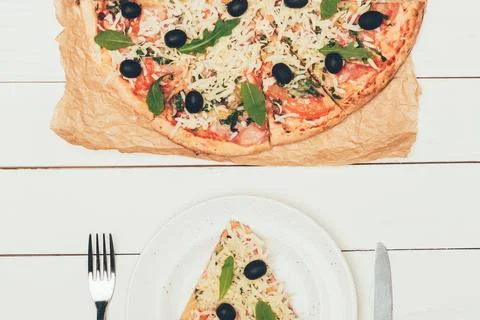 Pizza slice served white plate Stock Photos