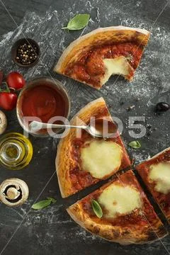 Pizza slices with mozzarella Stock Photos