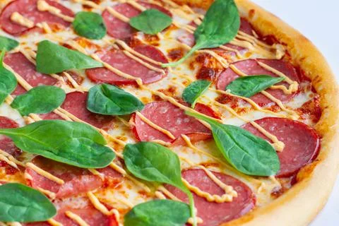 Pizza with spinach close-up Foto stock