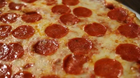 Pizza Spinning Around Stock Footage 13250305