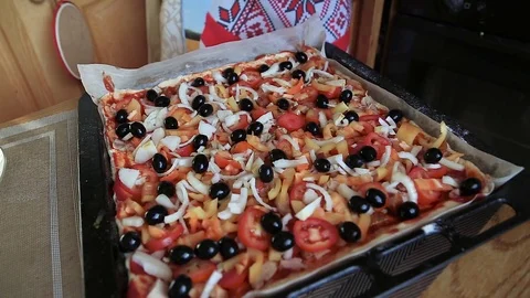 Pizza is sprinkled with cheese Stock Footage 79925998