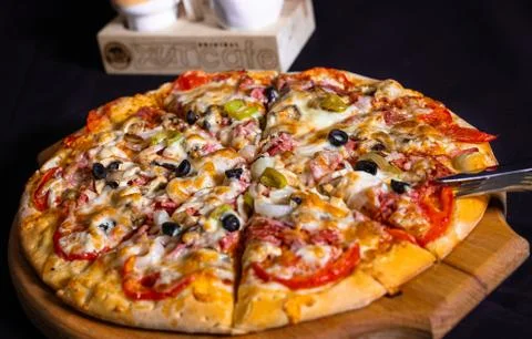 Pizza in table Stock Photos