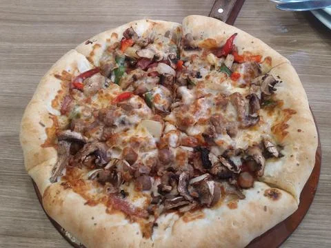 Pizza on the table Stock Photos