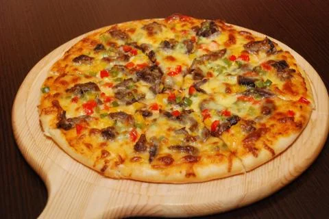 Pizza on the thin dough with cheese Stock Photos