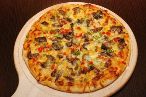 Pizza on the thin dough with cheese Stock Photos