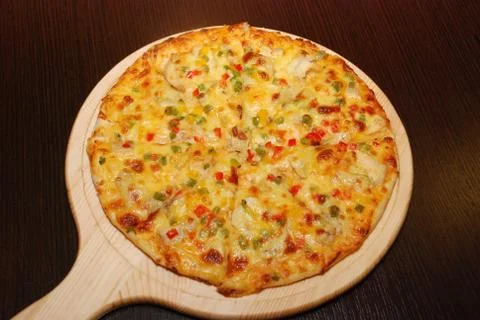 Pizza on the thin dough with cheese Stock Photos