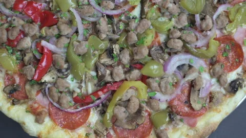 Pizza top down slide in slow motion 1080P Stock Footage 131684056