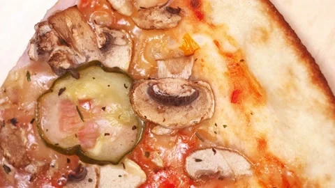 Pizza top view. Rotating a slice of pizza close-up Stock Footage 167797643