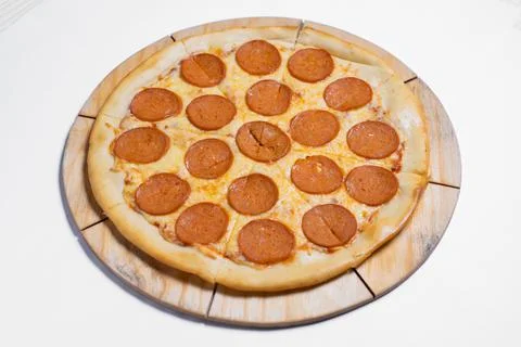 Pizza top view on white table isolated Stock Photos