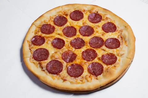 Pizza top view on white table isolated Stock Photos