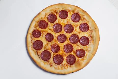 Pizza top view on white table isolated Stock Photos