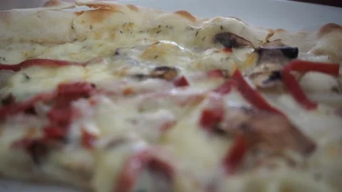 Pizza topped with melted cheese, sliced ​​meat and mushrooms Stock Footage 255119341