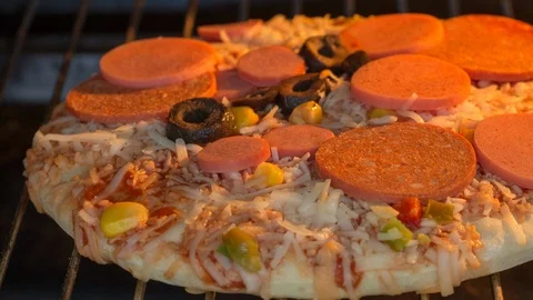 Pizza when cooked in the oven, close-up 4k timelapse, hyperlapse Stock Footage 93927773