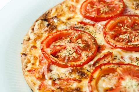 Pizza on a white plate Stock Photos