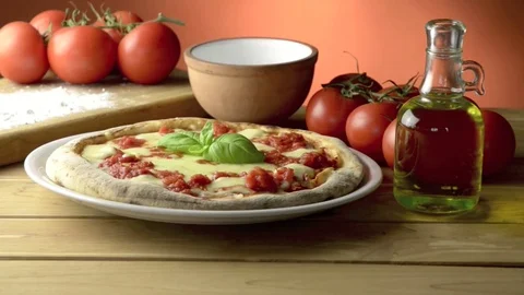 Pizza on the wooden table Video stock 74117327
