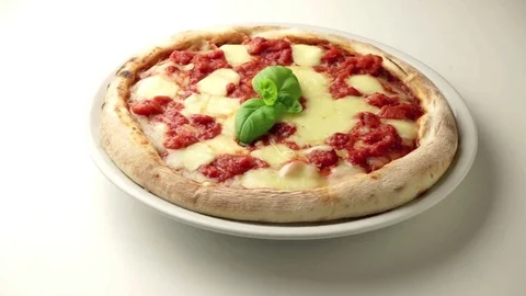 Pizza on the wooden table Video stock 74118320