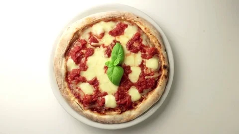 Pizza on the wooden table Video stock 74119425
