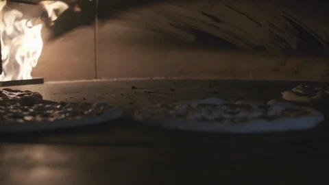 Pizzas Baking Stock Footage 128813132