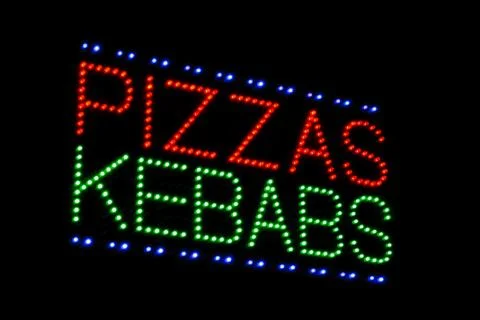 Pizzas kebabs light emitting diode sign Stock Photos