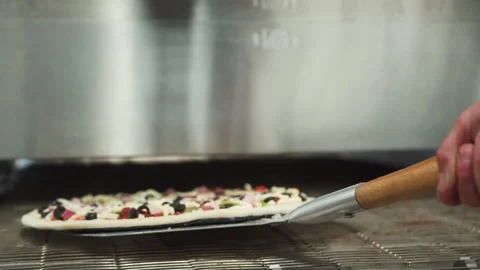 Pizza's in the oven. Stock Footage 131794550