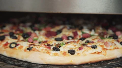 Pizza's in the oven. Stock Footage 131794844