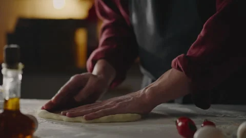 Pizzeria, Chef Baker Cooks Carefully From Dough Forms Creates Round Pizza Sh Stock Footage 243003113