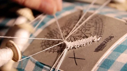 Pizzo bobbin craftwork  make lace in alta badia Stock Footage 75960108