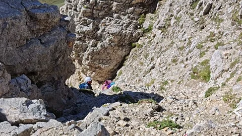 PIZZO INTERMESOLI, ITALY - SEPTEMBER 7, 2024: Climbers go to Pizzo Intermesoli Stock Footage 284088170