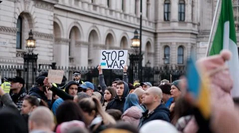 Placard reading 'Stop War' at Protest against Russian invasion of Ukraine, UK Stock Photos