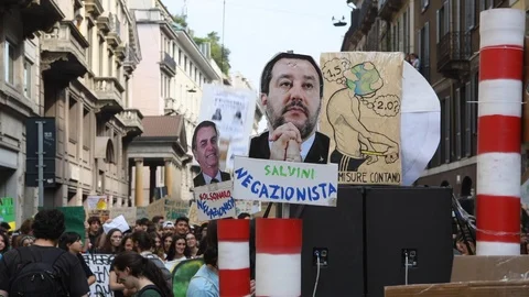 Placards of Matteo Salvini during a climate change rally 스톡 동영상 108545480