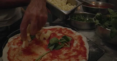 Place Cheese on Pizza Base Video stock 148130474