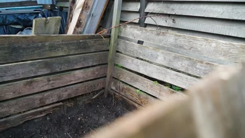 A place for composting organic garbage and food waste on a private plot Stock Footage 240902523
