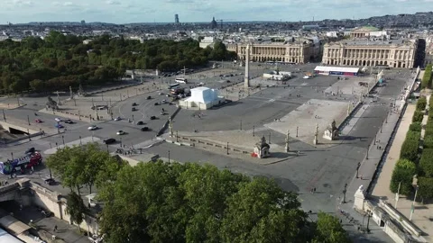 Place de la Concorde square in Paris with car traffic on sunny summer day, Stock Footage 248405923