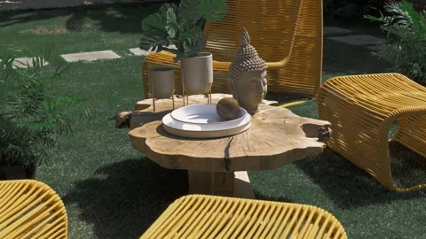 Place for dinner in the villa's courtyard with a tropical garden and comfortable Video stock 220772467