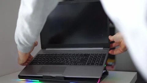 Place it on a laptop stand Stock Footage 261111021