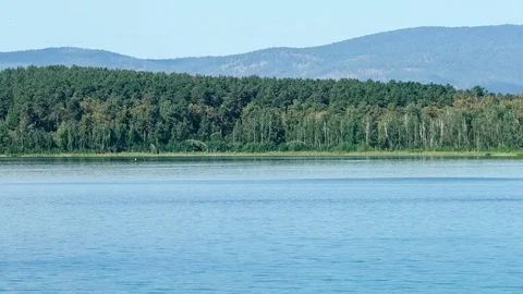 Place of meteorite fall. Chebarkul lake. Mountain forest. Panorama. Gray sky Stock Footage 73794306