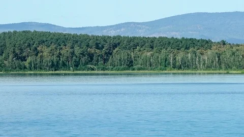 Place of meteorite fall. Chebarkul lake. Mountain forest. Panorama. Gray sky Stock Footage 73795081