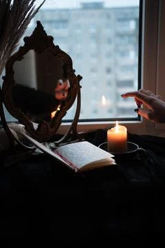 The place of the modern witch by the window Stock Photos