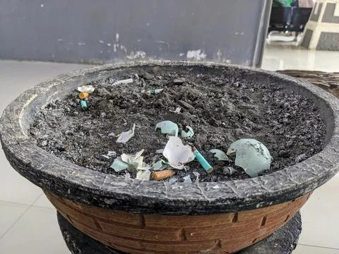 A place to put out sand-filled cigarette butts in public places Stock Photos